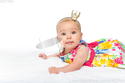 Image of happy beautiful baby girl with crown on head