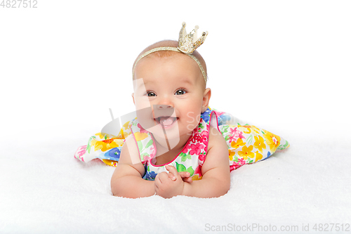 Image of happy beautiful baby girl with crown on head