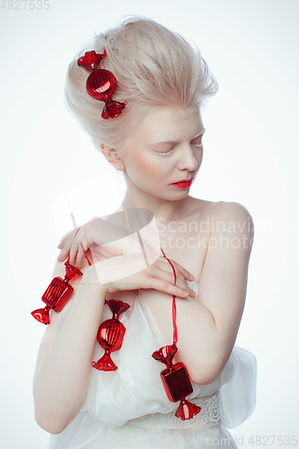 Image of beautiful albino young woman with red lips