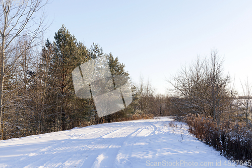 Image of traces of the car in the snow