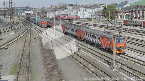 Image of BARNAUL - AUGUST 22: Red passenger train on railway station on August 22, 2017 in Barnaul, Russia