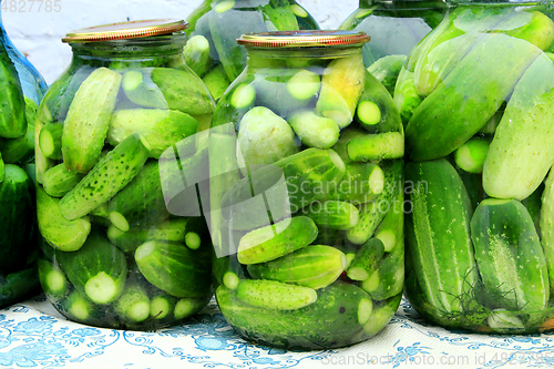 Image of Cucumbers in the jars prepared for preservation