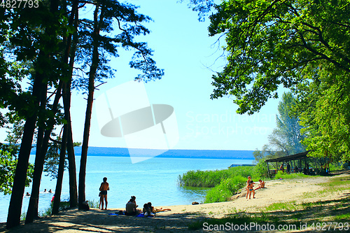 Image of people have a rest on beautiful Pecheneg reservoir