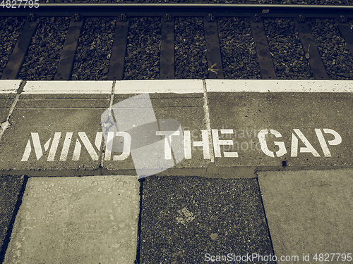 Image of Vintage looking Mind the gap in London