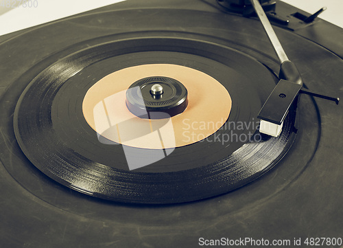 Image of Vintage looking Vinyl record on turntable