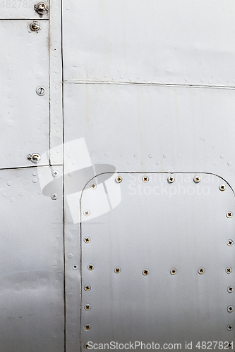 Image of metal surface with rivets