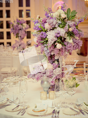 Image of Festive table decoration in Lilac colours.