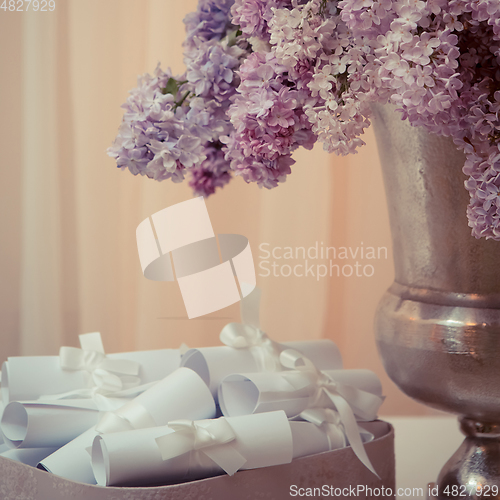 Image of Lilac bouquet in a silver vase