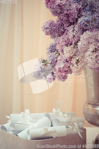 Image of Lilac bouquet in a silver vase
