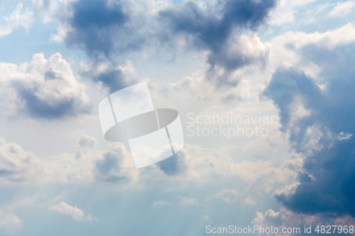 Image of White clouds on blue sky background