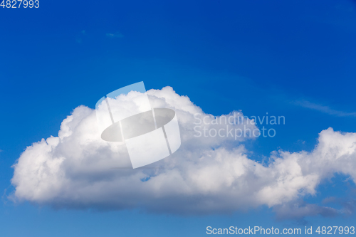 Image of White clouds on blue sky background