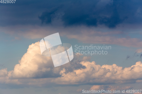 Image of White clouds on blue sky background