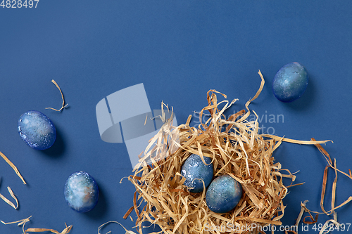 Image of Egg hunt is coming. Easter traditions, space, cosmos colored eggs, top view