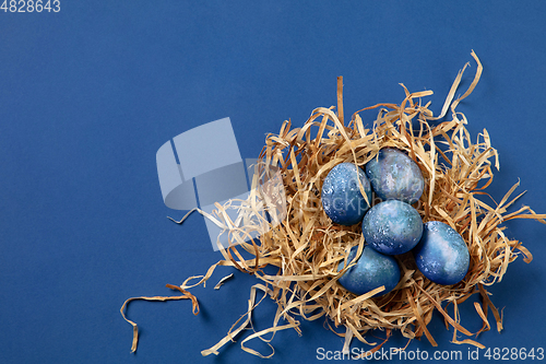 Image of Egg hunt is coming. Easter traditions, space, cosmos colored eggs, top view