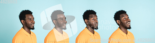 Image of Portrait of African man isolated on blue studio background with copyspace. Collage
