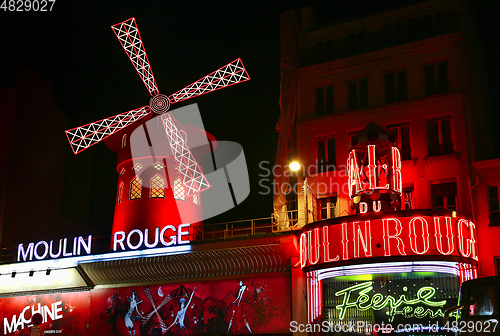 Image of View of the Moulin Rouge (Red Mill) at night in Paris, France