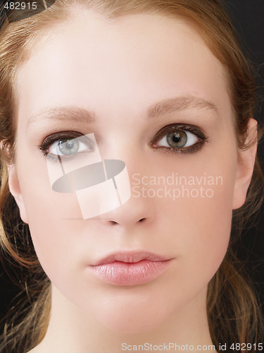 Image of Closeup of pretty blond woman no smile