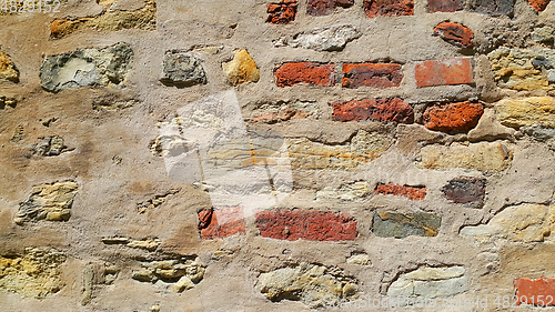 Image of Very ancient wall with stones and bricks