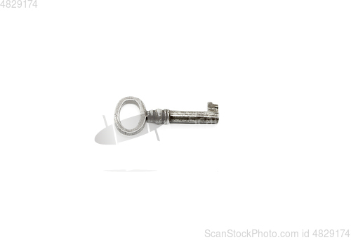 Image of Vintage silver key isolated on white background