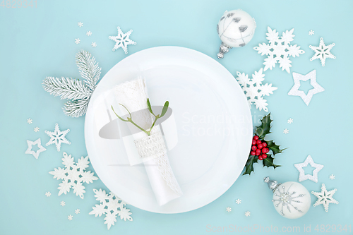 Image of Christmas Table Setting with White Decorations and Flora