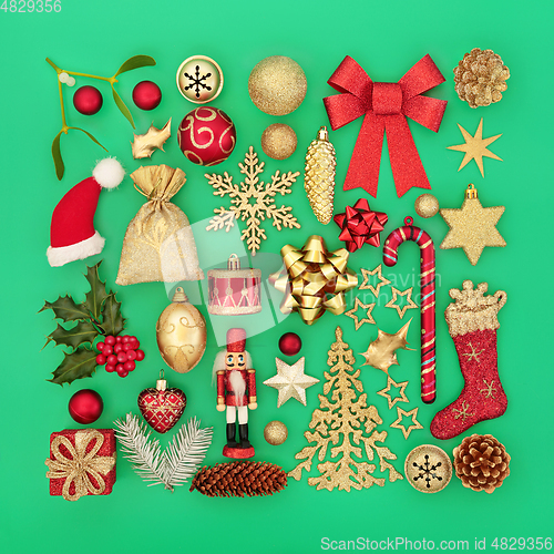Image of Christmas Red and Gold Bauble Decorations and Greenery