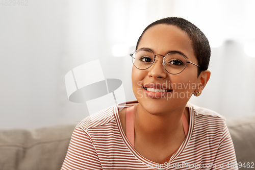 Image of portrait of african american woman in glasses