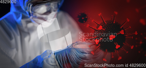 Image of close up of scientist and coronavirus hologram