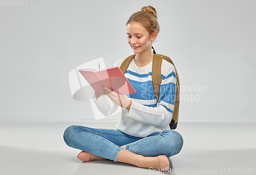 Image of teenage student girl with school bag and notebook