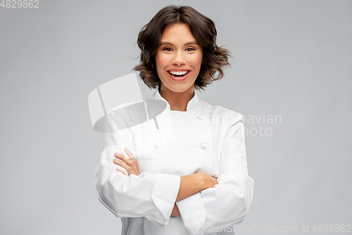 Image of smiling female chef in toque