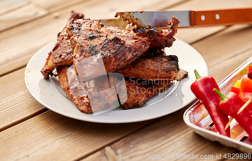 Image of grilled barbecue meat stack on plate