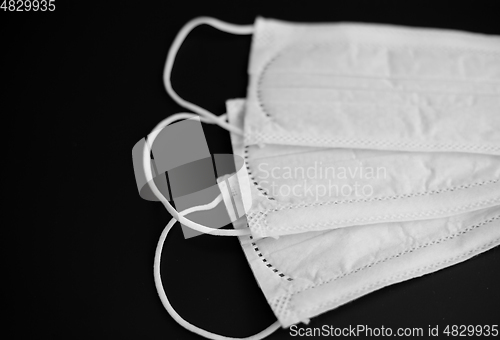 Image of close up of white face protective medical masks