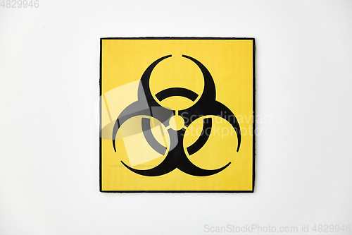 Image of biohazard caution sign on white background