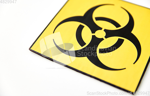 Image of biohazard caution sign on white background