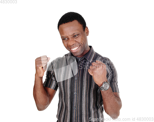 Image of Young African man is happy over victory