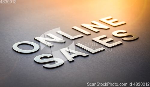 Image of Word online sales written with white solid letters