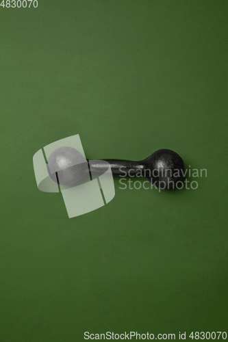 Image of Sport equipment isolated on green studio background