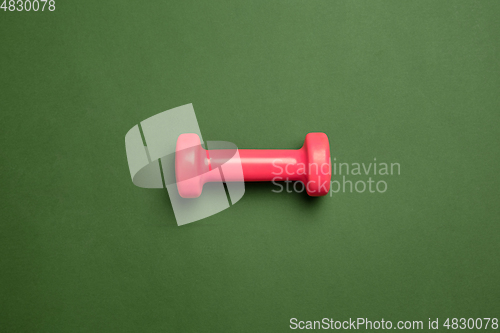 Image of Sport equipment isolated on green studio background