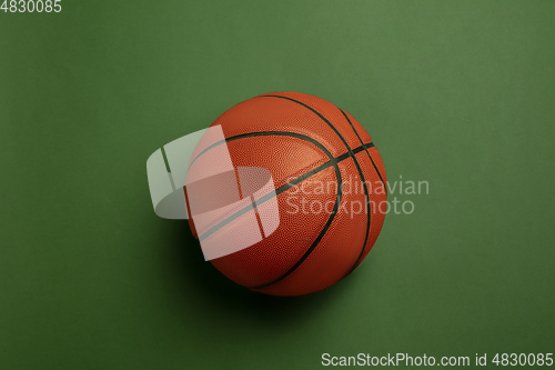 Image of Sport equipment isolated on green studio background