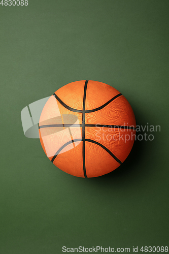 Image of Sport equipment isolated on green studio background