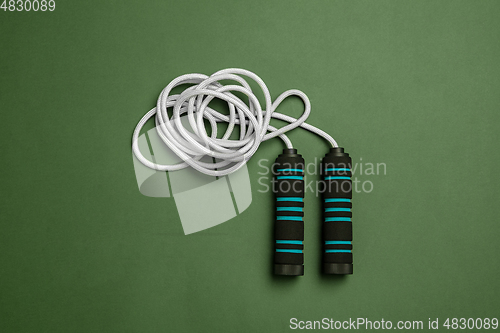 Image of Sport equipment isolated on green studio background