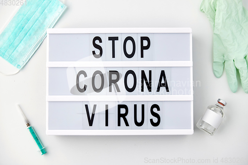 Image of lightbox with stop coronavirus caution words