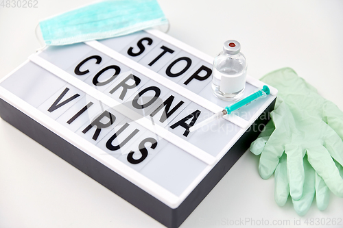 Image of lightbox with stop coronavirus caution words