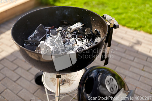 Image of close up of charcoal smoldering in brazier