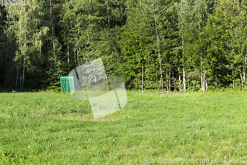 Image of wooden toilet, forest