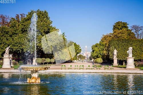 Image of Tuileries Garden pond, Obelisk and triumphal arch, Paris, France