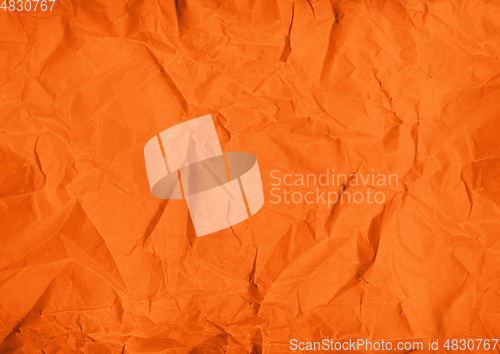 Image of orange crumpled paper texture background