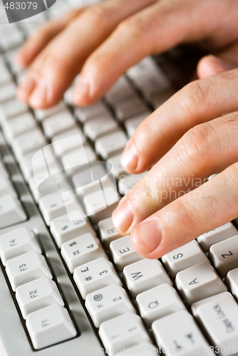 Image of hands typing