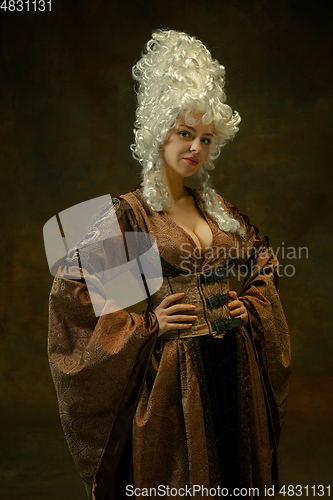 Image of Medieval young woman in old-fashioned costume