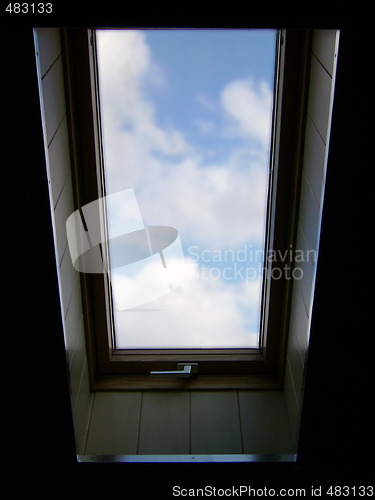 Image of The sky in a window on an attic