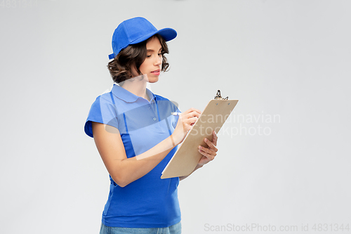 Image of delivery girl with clipboard and pen writing